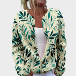 Friedel – Strickjacke mit grünen Blättern auf Weiß