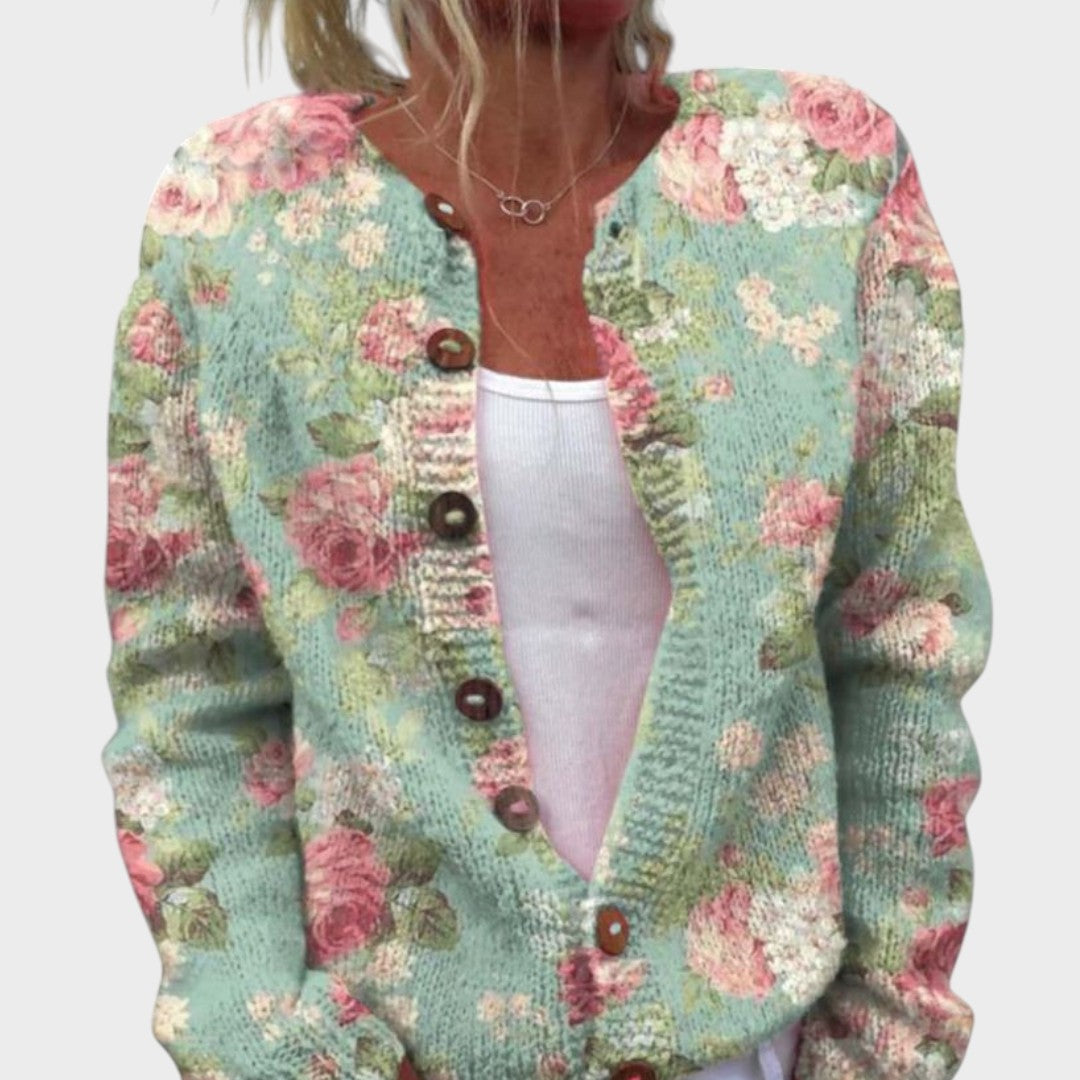Vroni – Strickjacke in Mintgrün mit weißen Blüten