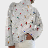 Camilla | Rollkragenpullover mit Streublüten in Hellgrau