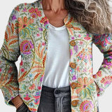 Klara – Strickjacke mit Blüten- und Rankenmuster in Rosé, Gold und Türkis – Elara München