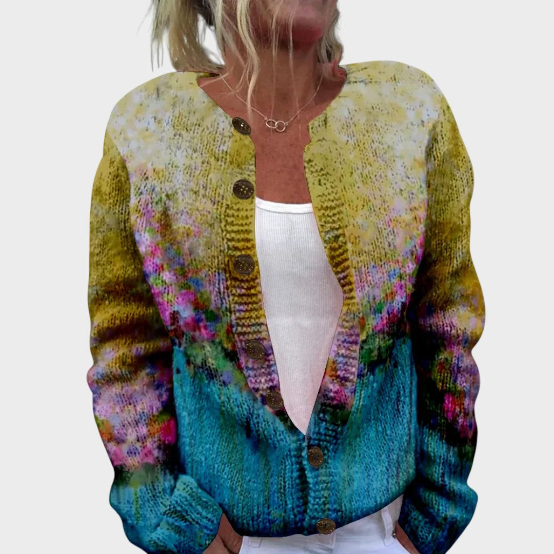 Rita – Strickjacke in Olivgrün mit gelben Blüten