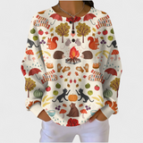 Alma - Cremefarbener Pullover mit herbstlichem Waldmotiv