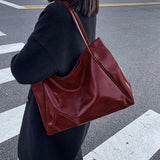 Patricia | Glänzende Lederhandtasche