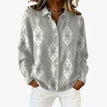 Luise – graue Strickjacke mit geometrischer Stickerei