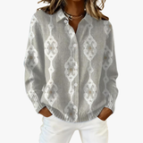 Luise – graue Strickjacke mit geometrischer Stickerei