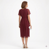 Lena | Kleid mit Drapierung und Rüschen