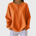 Hélène – oranger Pullover aus weichem Waffelstrick