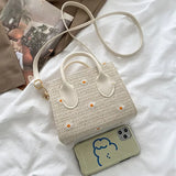 Strohtasche fur Damen – Geflochtene Handtasche mit Blumenakzenten
